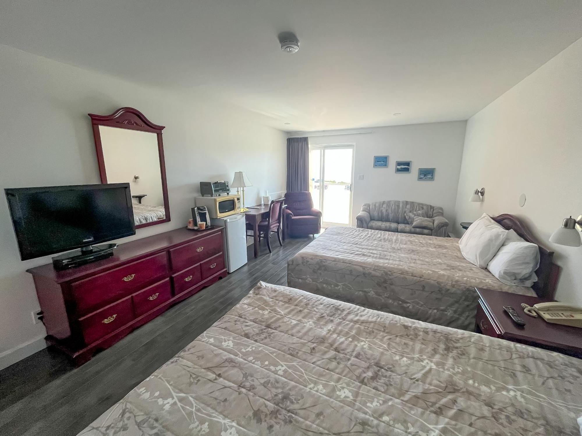 Complexe Hotelier Escoumins Лез-Эскумен Экстерьер фото
